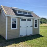 a tan two-door shed
