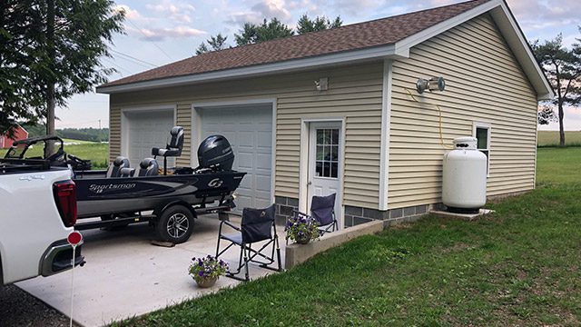 a garage for a boat and a car