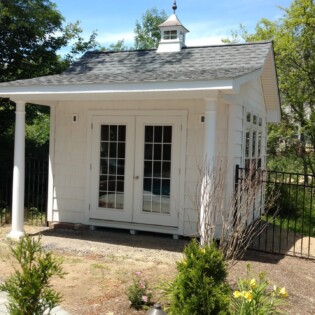 12x12 Vinyl shake siding with porch, French doors, custom windows, cupola, roof was built on site