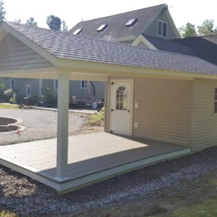 12x26 Pool house, 16' of open composite decking porch with a 3' 11 lite door to inclosed 10x12 shed area to be used as you wish.